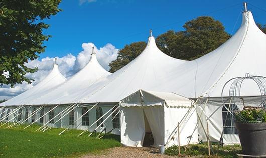 portable restrooms arranged for a event, providing quick and easy access for attendees in Claxton